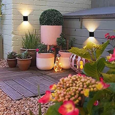 Brighten your exterior effortlessly with this solar LED wall lamp