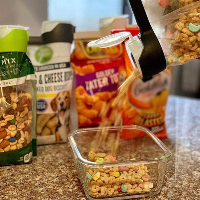 Hermetic caps with pouring spout for pouches