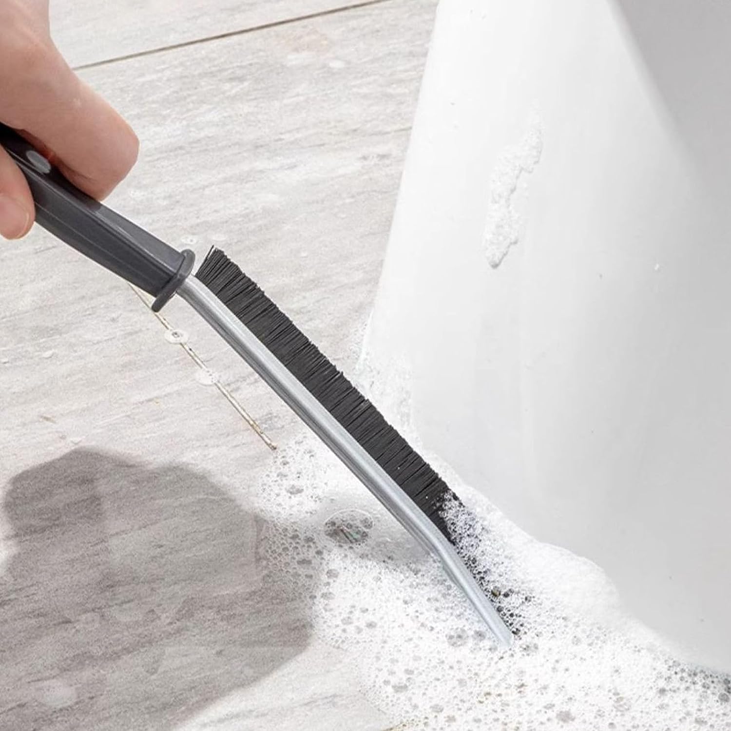 Curved cleaning brush with ultra-fine bristles