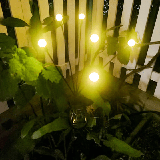 Garden lamps with fireflies